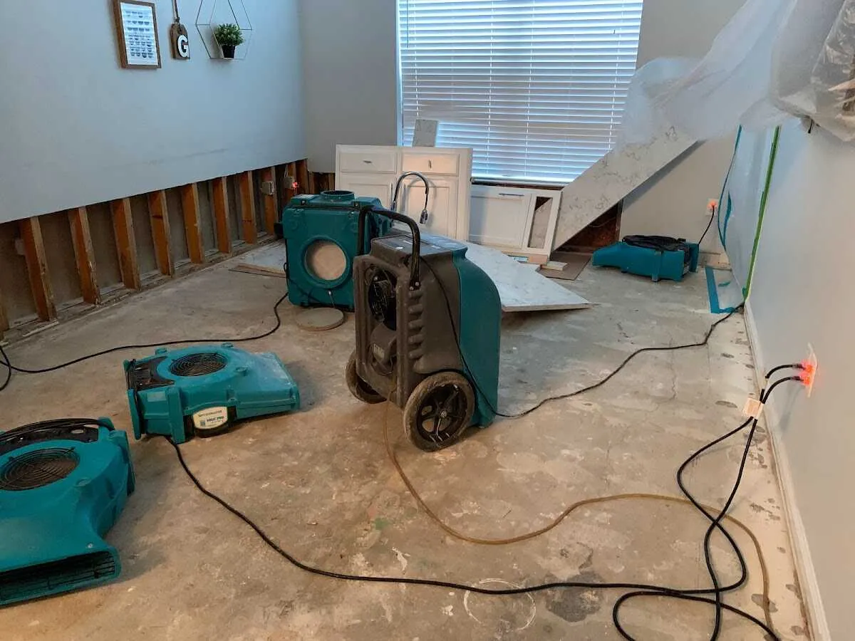 Dehumidifier in flood-cut room for Water Damage Restoration in Summit